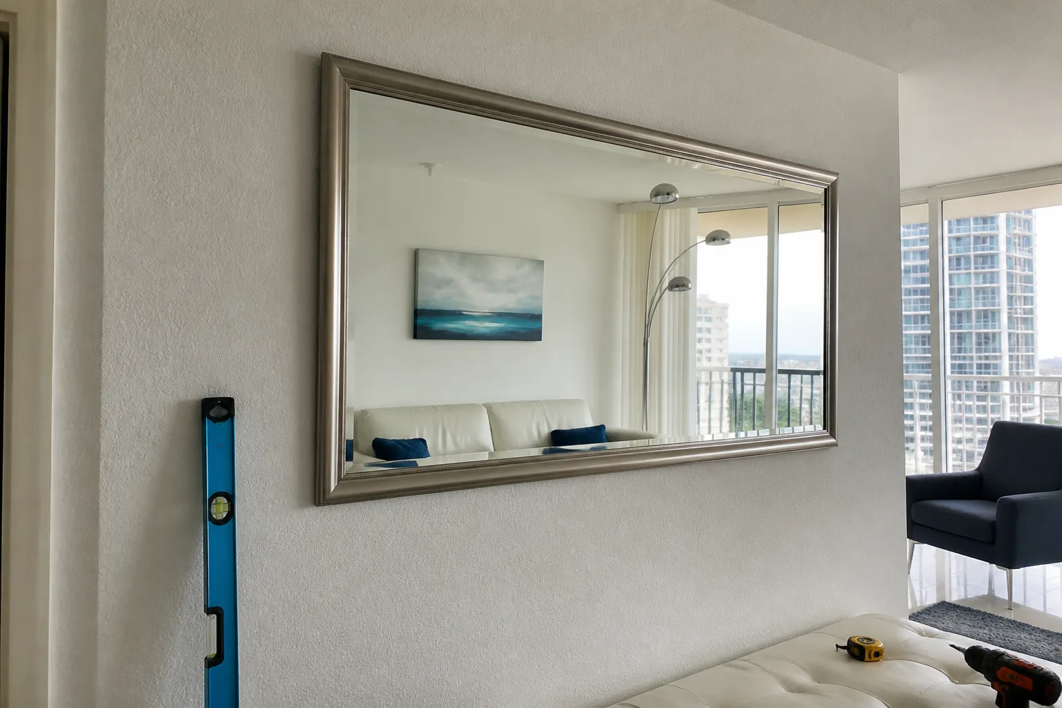 Shelf and picture hanging in Miami by Gold Hands