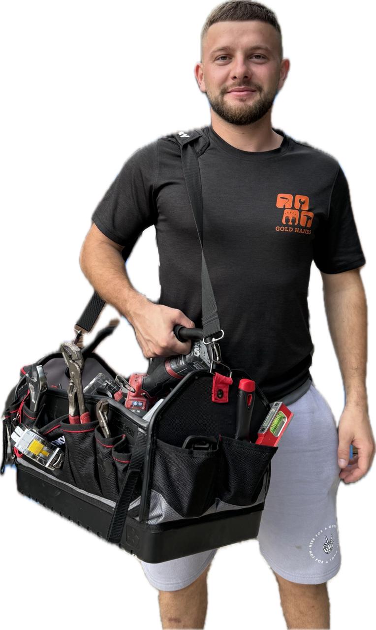 Gold Hands Miami handyman technician ready for work with full tool bag
