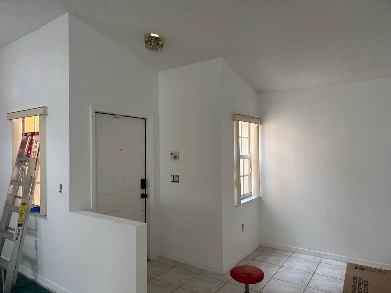 Smooth, freshly painted ceilings in a Miami home, a Gold Hands job