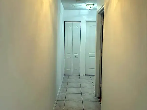 Freshly painted hallway with white doors
