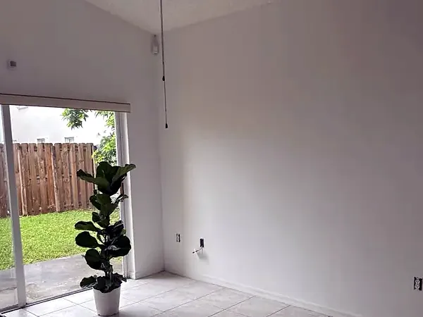 Freshly painted living room with a sliding glass door