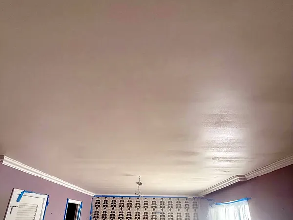 Ceiling skim-coated and sanded smooth before primer